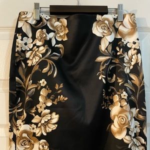White House Black Market skirt with neutral floral print. Like new condition.